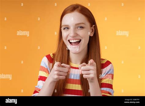Enthusiastic Carefree Friendly Redhead Girl Pointing Finger Pistols Camera Smiling Joyfully