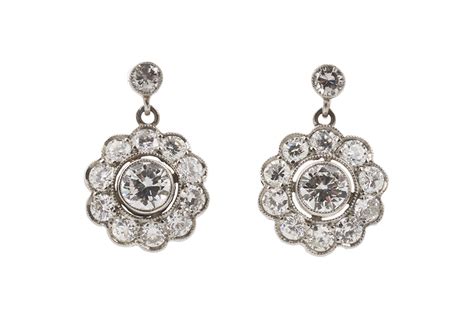 Art Deco Platinum And Diamond Cluster Earrings Shapiro Auctioneers