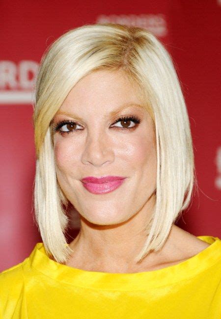 Tori spelling goes for the ultimate california girl look here with long blonde beachy waves. Tori Spelling's blonde, sleek hairstyle | SheKnows ...