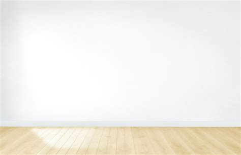 White Wallpaper In An Empty Room With Wooden Floor Premium Image By