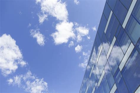 Blue Glass Windows Sky Clouds Architecture Building Exterior
