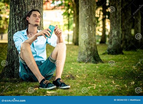 Male Relaxing Under Tree Outdoors Stock Image Image Of Posing Park