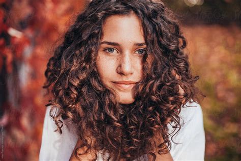 Beautiful Young Woman With Curly Hair Blue Eyes And Freckles By Maja