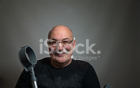 Smiling Mature Bald Man With Crutches Stock Photo Royalty Free