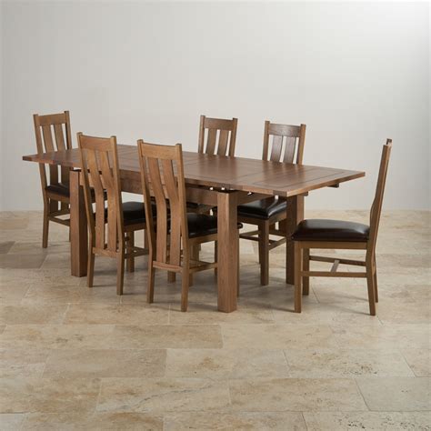 Dfs no longer sell this table set in the dark brown colour. Rustic Oak Extending Dining Table + 6 Arched Back Leather ...