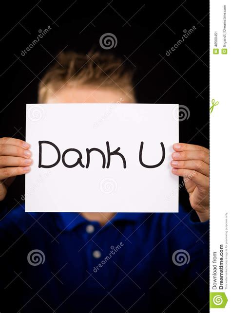 Child Holding Sign With Dutch Words Dank U Thank You Stock Image
