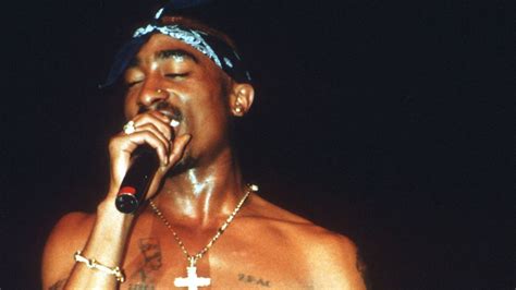 A Look At Tupac Shakurs Rule Breaking Style On And Off The Stage Vogue