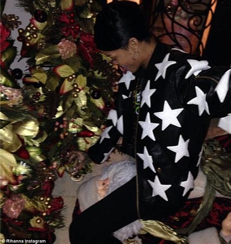 rihanna shows santa her naughty side as she straddles his face daily mail online
