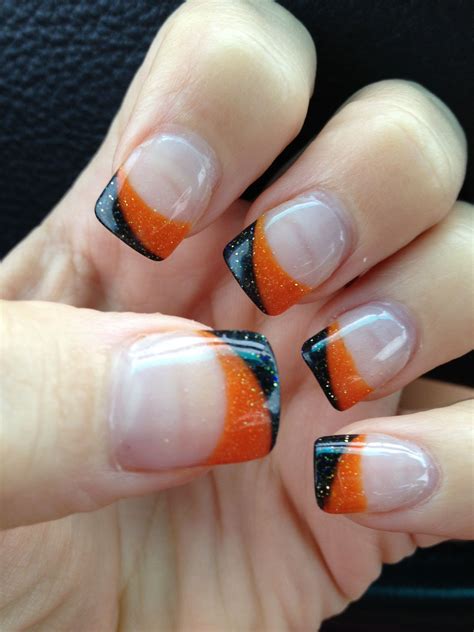 Make A Bold Statement With Orange And Black Nail Designs The Fshn