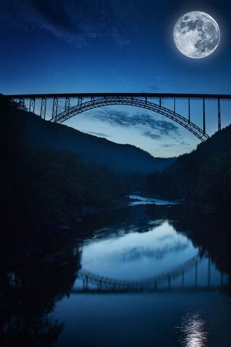 New River Gorge Bridge In West Virginia At Night By The Light Of A Full
