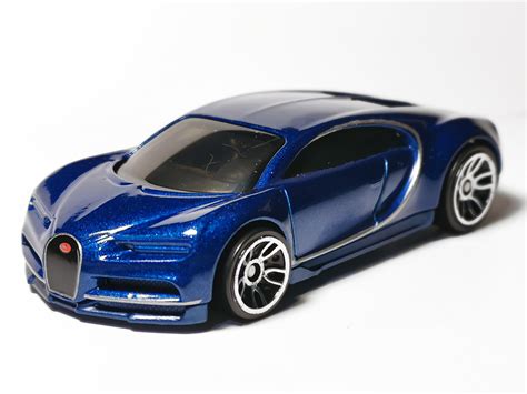 View details and collect the hot wheels '16 bugatti chiron racecar in black. HOT WHEELS 16 BUGATTI CHIRON Blue AND Black Variations ...