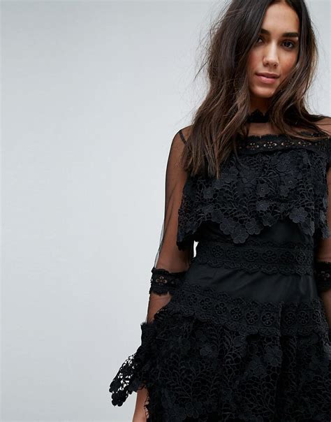 lyst prettylittlething premium lace dress with mesh sleeve in black