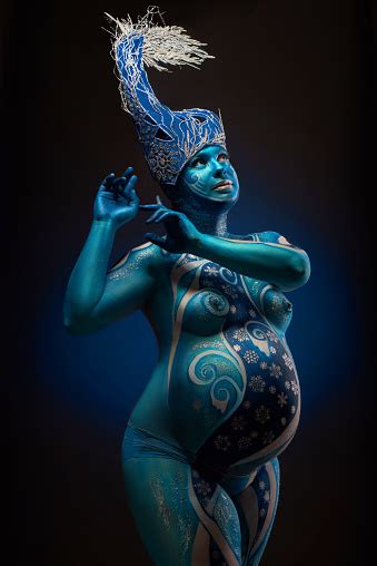 Beautiful Pregnant Woman With Headwear And Abstract Body