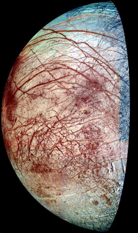 The Icy Surface Of Europa Is Shown Strewn With Cracks Ridges And