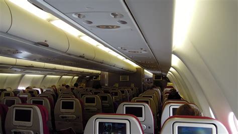 Still very nice but i think a bit older. Malaysia Airlines Airbus A330-300, Economy cabin, inflight ...