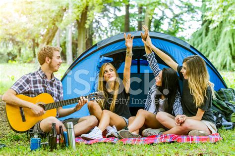 Group Of Friends Having Fun At Camping Stock Photo Royalty Free