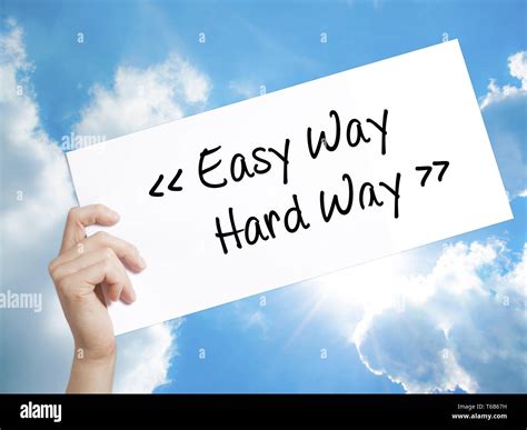 Easy Way Hard Way Sign On White Paper Man Hand Holding Paper With