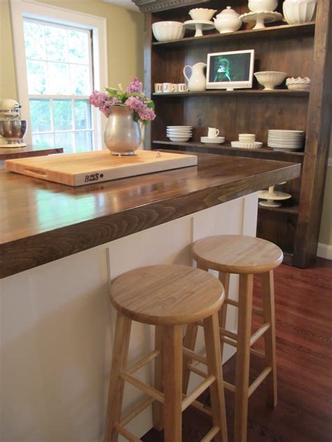 If a butcher block seems expensive, you can opt for this cheaper wood countertop. Jenny Steffens Hobick: Kitchen Island | DIY Kitchen Island with Built-In Refridgerator