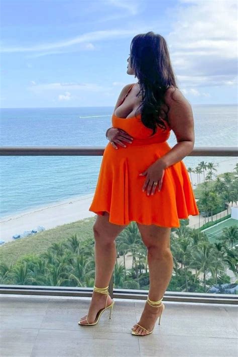 Pregnant Ashley Graham Poses On Her Hotel Balcony For Revlon Press In A