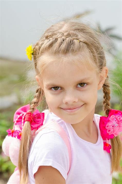Portrait Of Beautiful Six Year Old Girl With Blond Hair Stock Photo