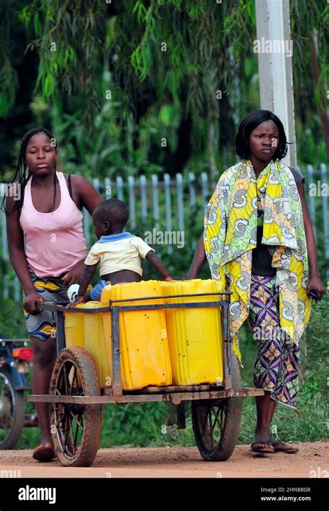 A Burkinabe Woman Pushing A Cart In Ouagadougou Burkina Faso Stock