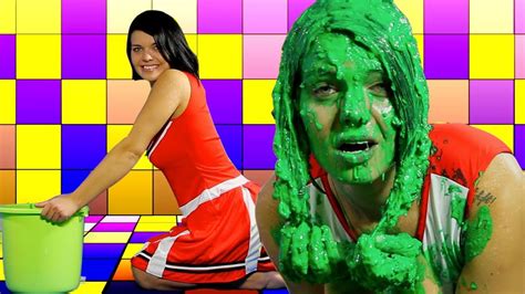 Sexy Cheerleader Dunks Her Head Into Bucket Of Slime Youtube