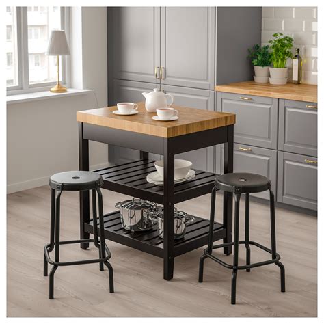 Oct 21, 2019 · in a chicago family home designed by steve kadlec and sasha adler, the modern kitchen features black lacquered and grass cloth walls and inset vintage brass vitrines, while showcasing the home's fine details through notched edges on the kitchen island countertop. IKEA Kitchen Islands You'll Love in 2021 - VisualHunt
