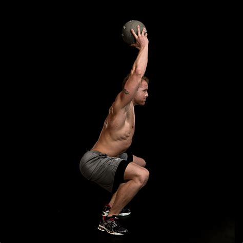 Medicine Ball Overhead Squat Video Watch Proper Form Get Tips And More