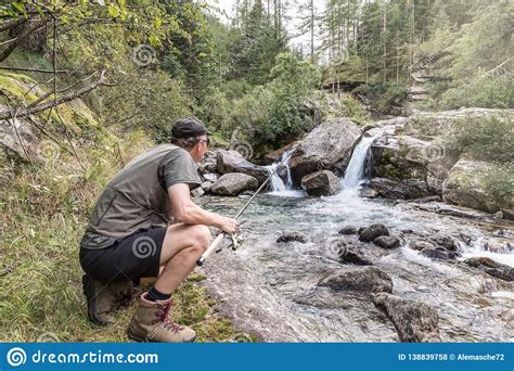 Fishing Adventures Fisherman On A Mountain Stream Stock Photo Image