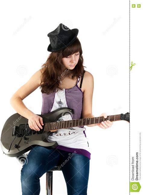 Beautiful Girl Playing The Guitar Royalty Free Stock Image