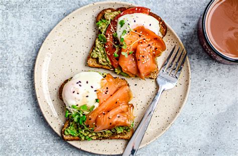 These french baked eggs with smoked salmon are to die for and a true gourmet breakfast. Smoked Salmon + Poached Eggs on Toast | Killing Thyme