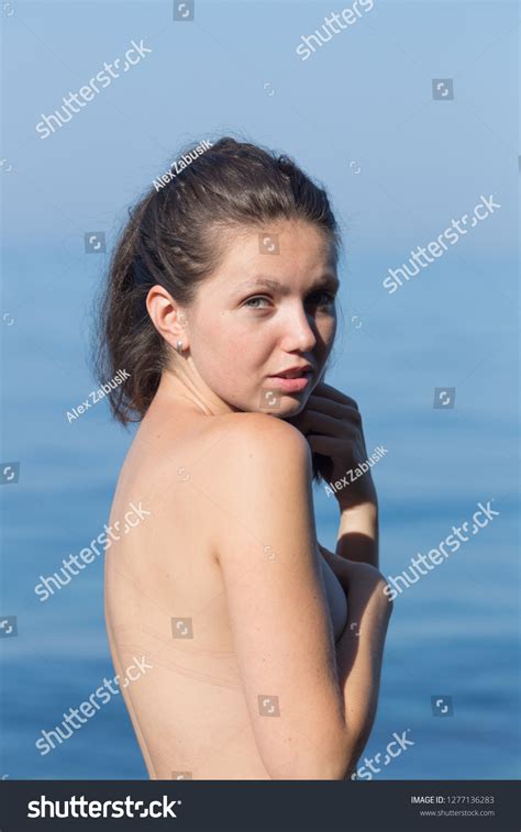 Womans Waist Portrait Against Sea Topless Stock Photo