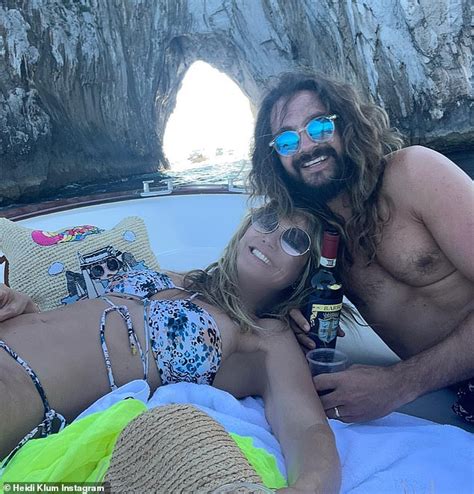 Heidi Klum Shows Off Her Toned Figure In A Halter Bikini Top As She Cuddles Trends Now