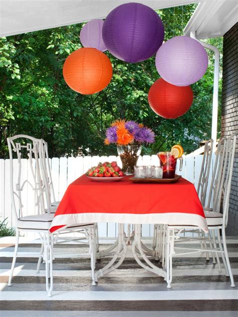 For a festive backyard party, use bright shades of orange, yellow, red, green and blue on painted seating and tables, multicolored place settings and. Outdoor Party Decorating Ideas : Food Network | Summer ...