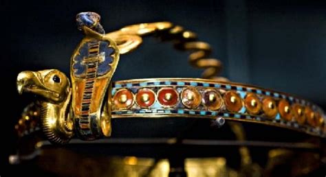 Although ancient egypt's innovations set it apart from other bygone cultures, it shares at least one thing in common: Ancient Egyptian gold diadem decorated with symbols of royal power - Kaleidoscope effect