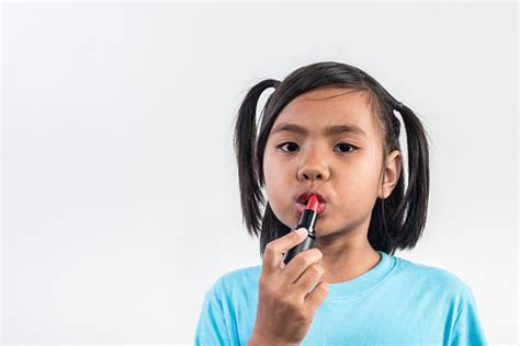 Portrait Little Girl Makeup With Her Face Stock Photo Download Image
