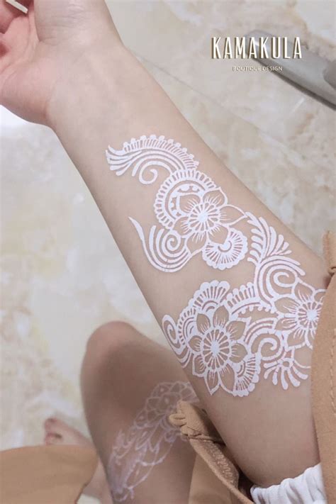 These tattoos looks great in both black and white inks and you don't even need any special. White Henna Lace Body Temporary Tattoo - Kamakula | White henna tattoo, White henna, Boho tattoos