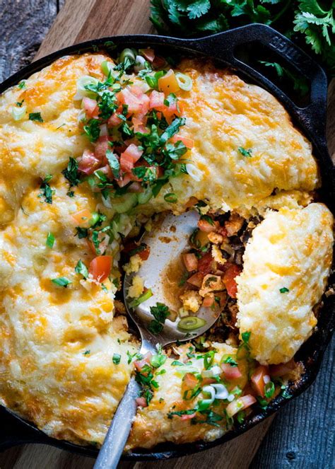 Add the coated chicken to the skillet and cook until well browned, about 5 minutes. Fiesta Skillet Chicken Cobbler | FaveSouthernRecipes.com