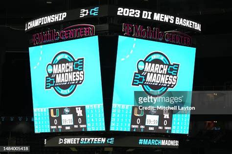 Sweet 16elite 8 March Madness Logo On The Scoreboard During The