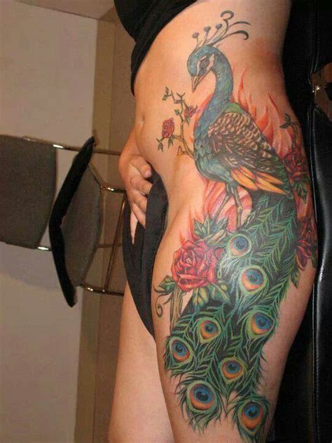 Pin By Lindsey Wright On Tattoos Peacock Tattoo Peacock Feather Tattoo Hip Tattoo