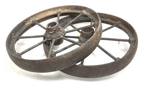 Lot 2pc Antique Cast Iron Wagon Wheels