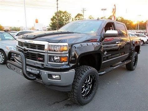 Read the vehicle owner's manual for important feature limitations and information. 2014 Chevy Silverado 1500 LTZ Black Widow Lifted Truck ...