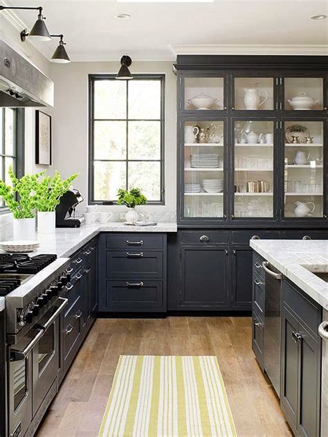 With dark gray cabinets a lovely white or pale colored tile is a great addition to the contemporary or modern kitchen. Designing Home: Thoughts on choosing dark kitchen cabinets