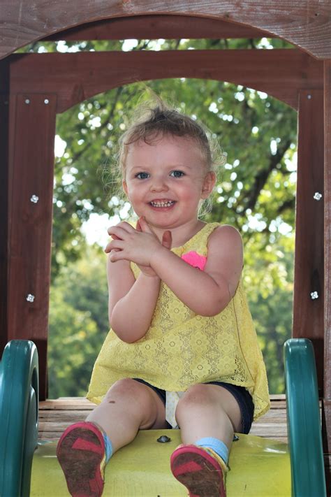 Happy Little Girl On Slide Free Stock Photo Public Domain Pictures
