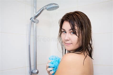Hygiene Concept Young Woman Washing Her Body In Shower Stock Image