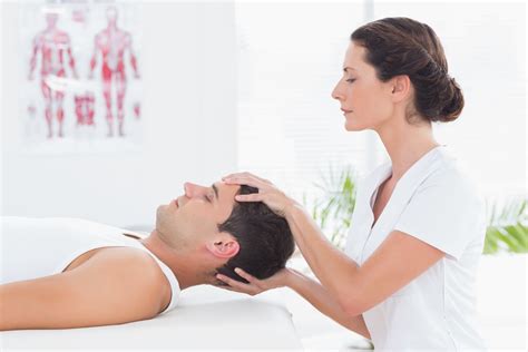 Man Receiving Head Massage In Medical Office Integrative Physical