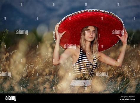 Young Girl With A Sombrero In The Early Evening Stock Photo Alamy