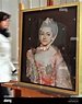 A woman walks past pastel painting'Henriette Catharina Agnese of Anhalt ...