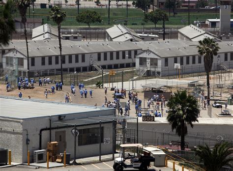 California Begins Moving Prison Inmates The New York Times