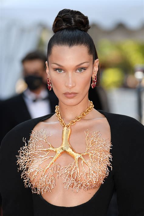 Bella Hadid Goes Topless With Bare Breasts Covered By Only Gold Lungs